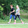 women walking with Nordic Poles