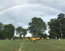 rainbow over football practice at Schoolhouse Park