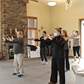 group of people practicing Tai Chi