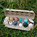 egg carton full of painted eggs