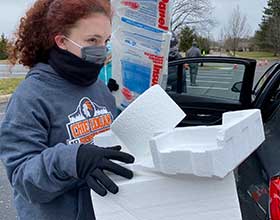 A person carrying Styrofoam