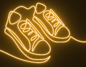 Continuous line drawing of sneakers. Line glows yellow on a black background.