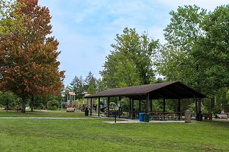 park shelter with a playground in the background