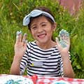 girl with fingerpaint on fingers